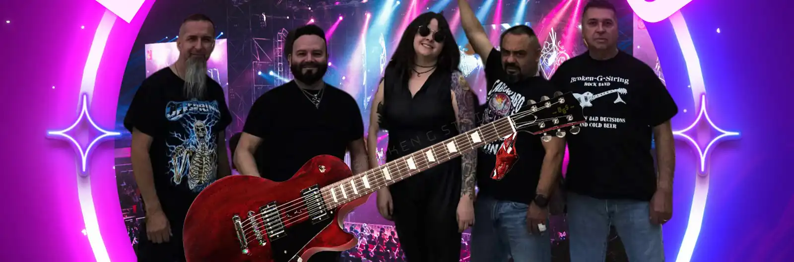 5 people standing in a row smiling with a large electric guitar in the front