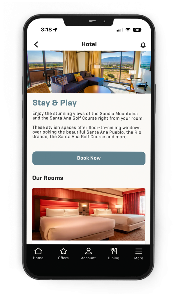 iPhone with a screenshot of the Hotel screen from the app
